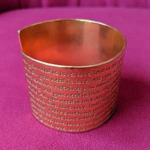"All you need is love" metal cuff bracelet with song lyrics